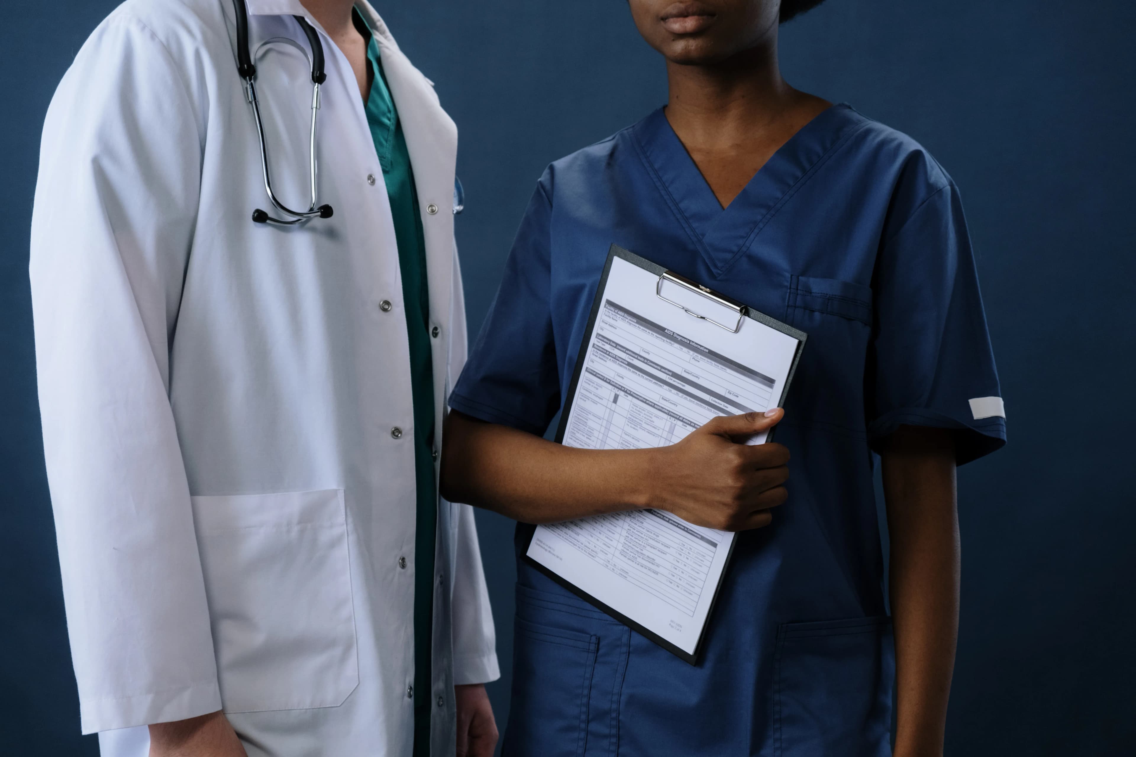 Clinician reviewing a diagnosis chart used to assign an ICD-10-CM code